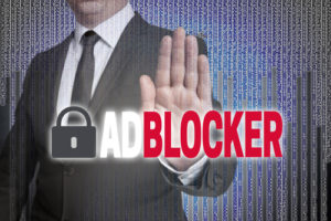 Adblocker with matrix is shown by businessman.