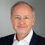 Porträtfoto von Florian Kraus, Partner und Leiter Vertrieb & Business Development der retailsolutions GmbH, einem Beratungshaus für SAP-Lösungen