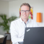 Porträtfoto von Christian Schäfer, Product Business Owner E-Commerce bei IT-Unternehmen Arvato Systems